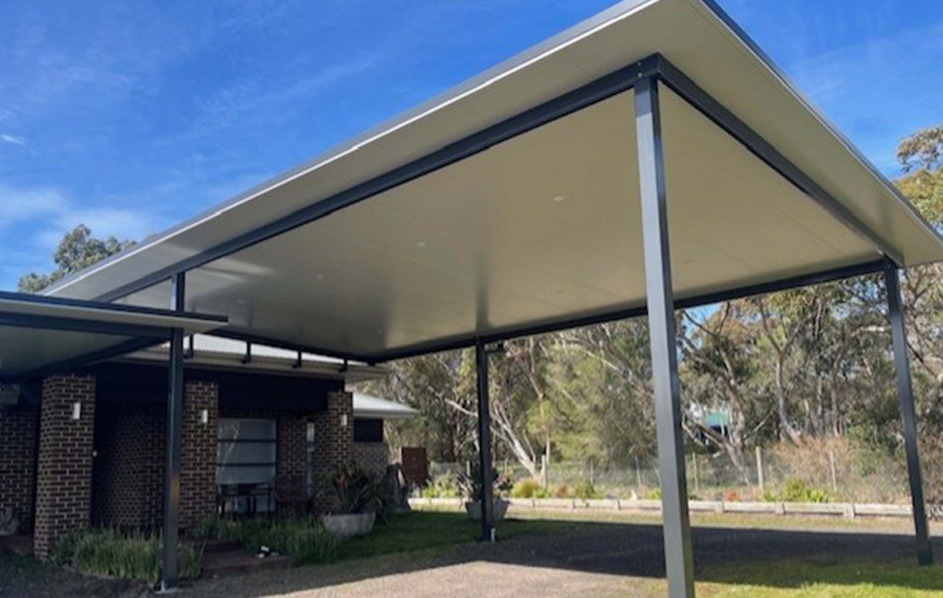 Custom flat roof carport outdoor shelter by Modern Solutions in Melbourne