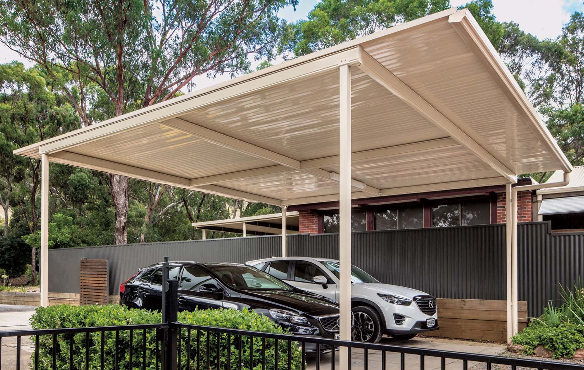 Contemporary flat roof patio with integrated lighting and timber-look posts