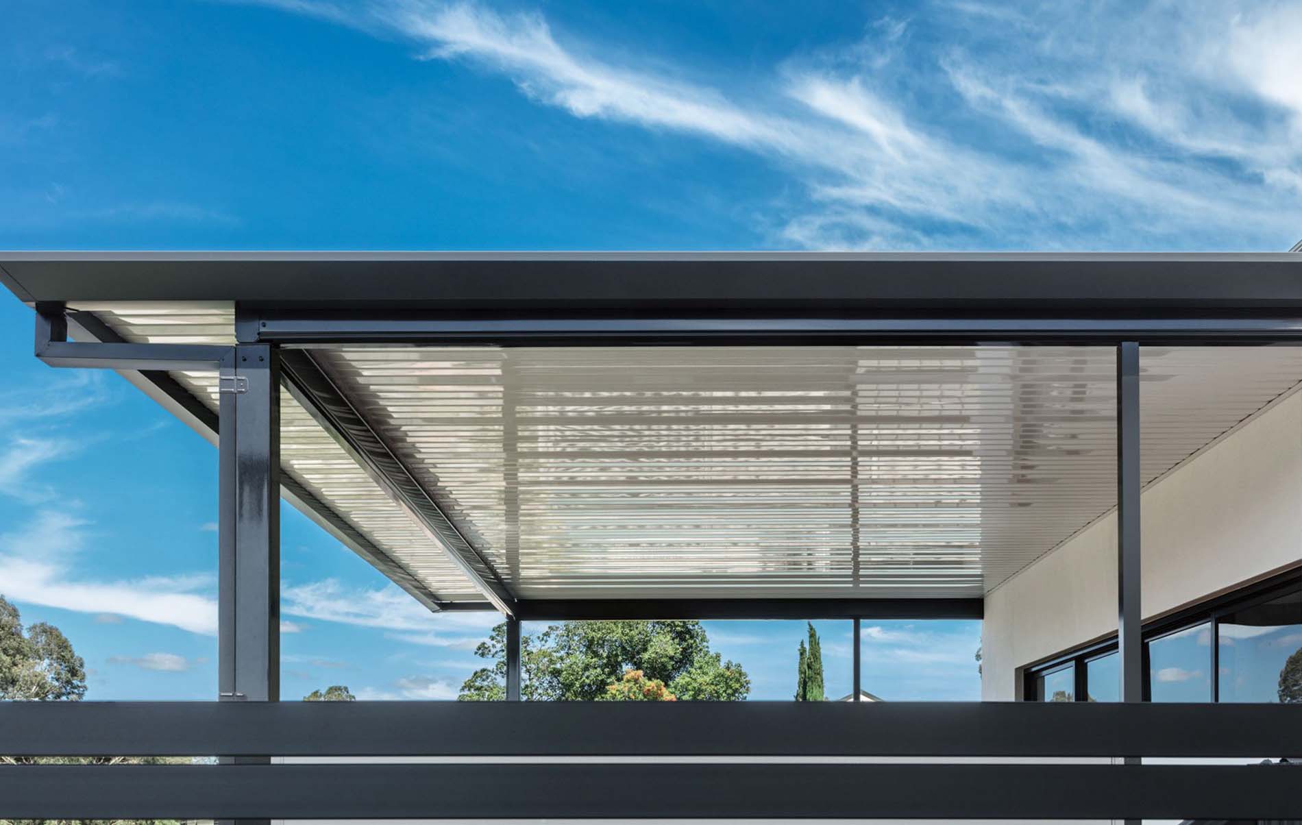 Modern flat roof patio with integrated lighting and timber-look posts