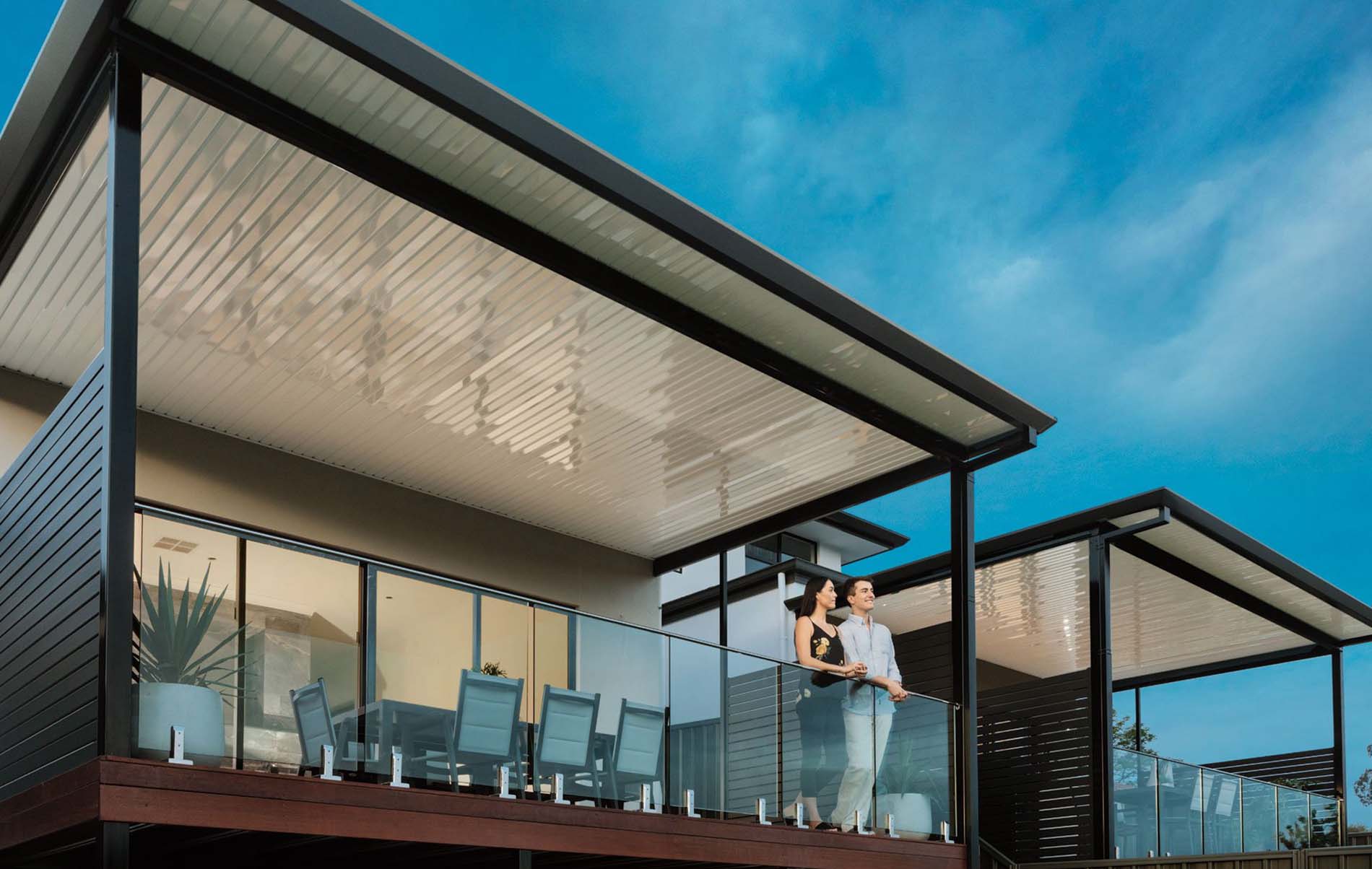 Modern flat roof patio with integrated lighting and timber-look posts