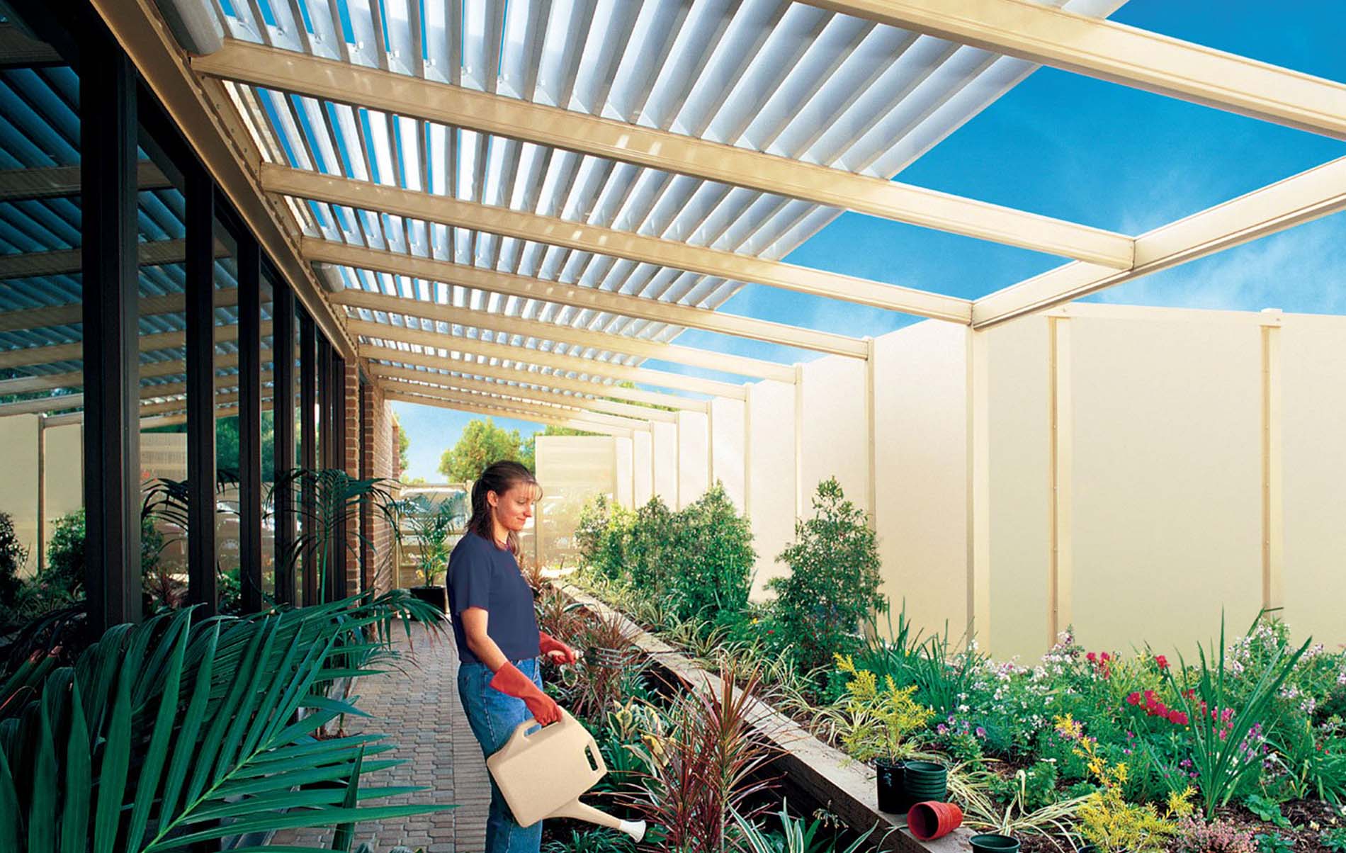 Sleek outdoor living space featuring Stratco Colorbond roof and modern structural post