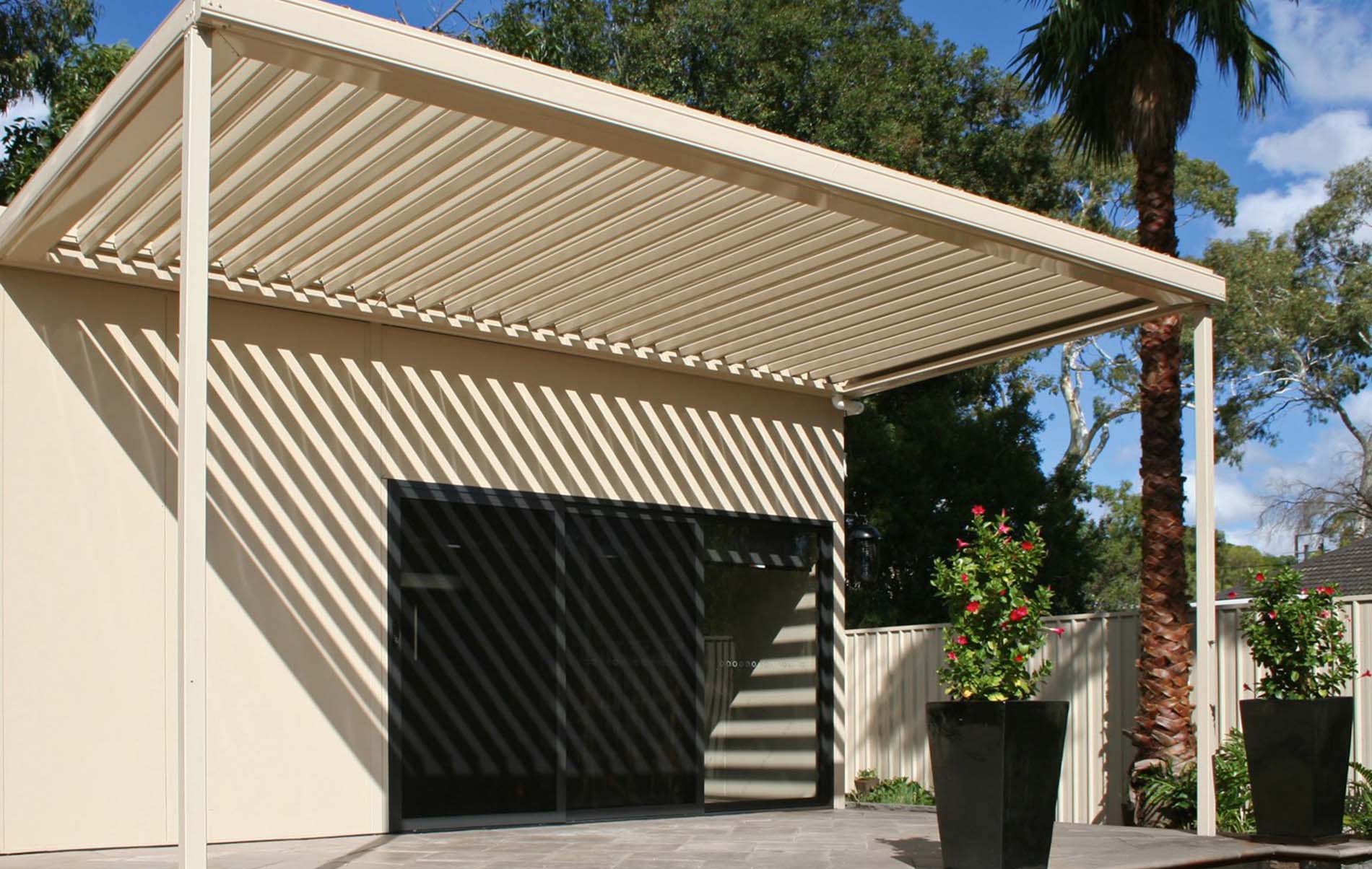 Closed louvre roof patio providing shade and weather protection