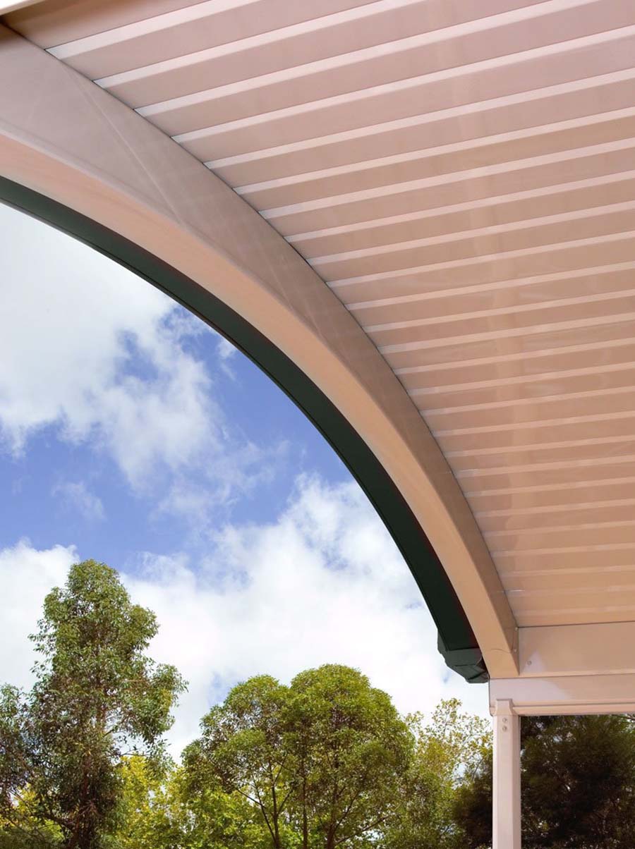 Close-up of curved patio frame with integrated lighting and high-gloss finish