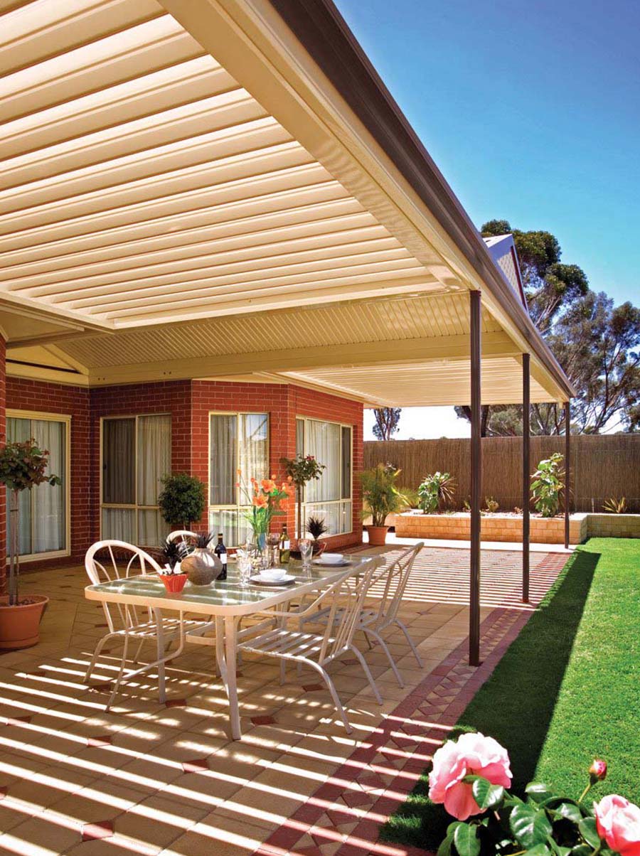 Vertical close-up of a louvre patio roof with adjustable slats and timber-look aluminium frame